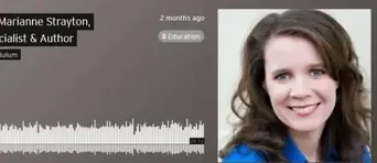 234 A woman is smiling and recording her audio message.